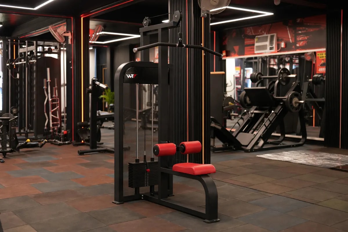 WTF FS-E6704 Lat Pull Down on a gym floor