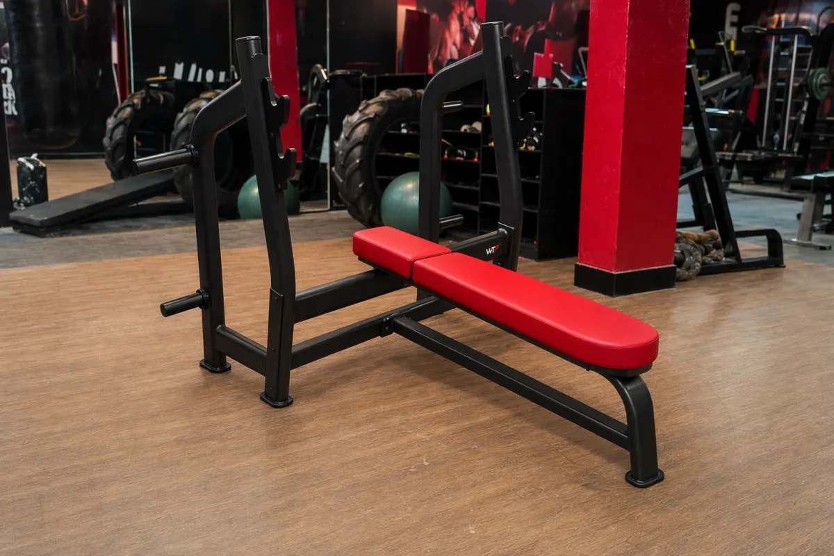 WTF J-023 Olympic Flat Bench on a gym floor