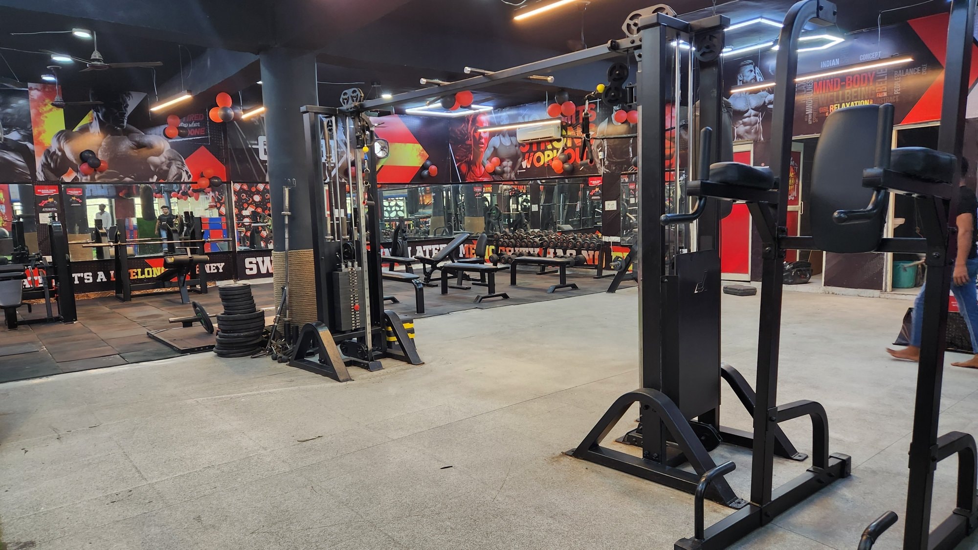 A cable strength station on a WTF gym floor