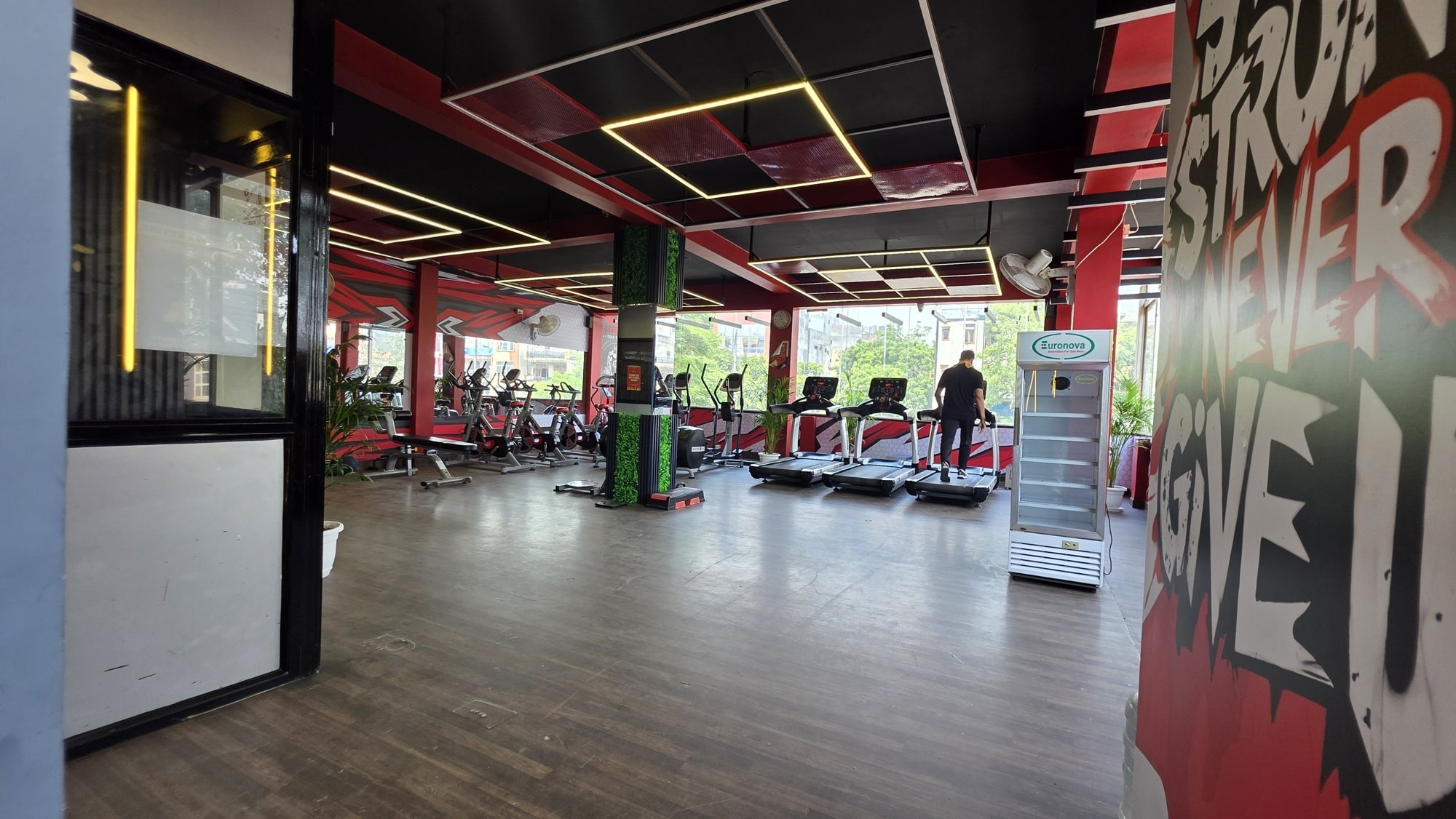 A wide view of a zoned WTF gym floor