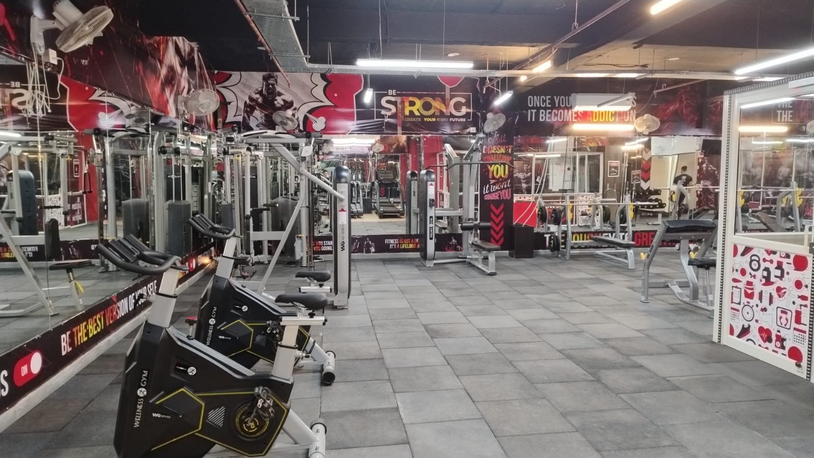 A cardio bike on the strength floor of a WTF gym