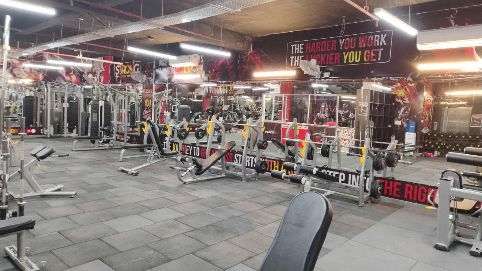 Selectorized and plate-loaded machines across the strength floor of a WTF gym